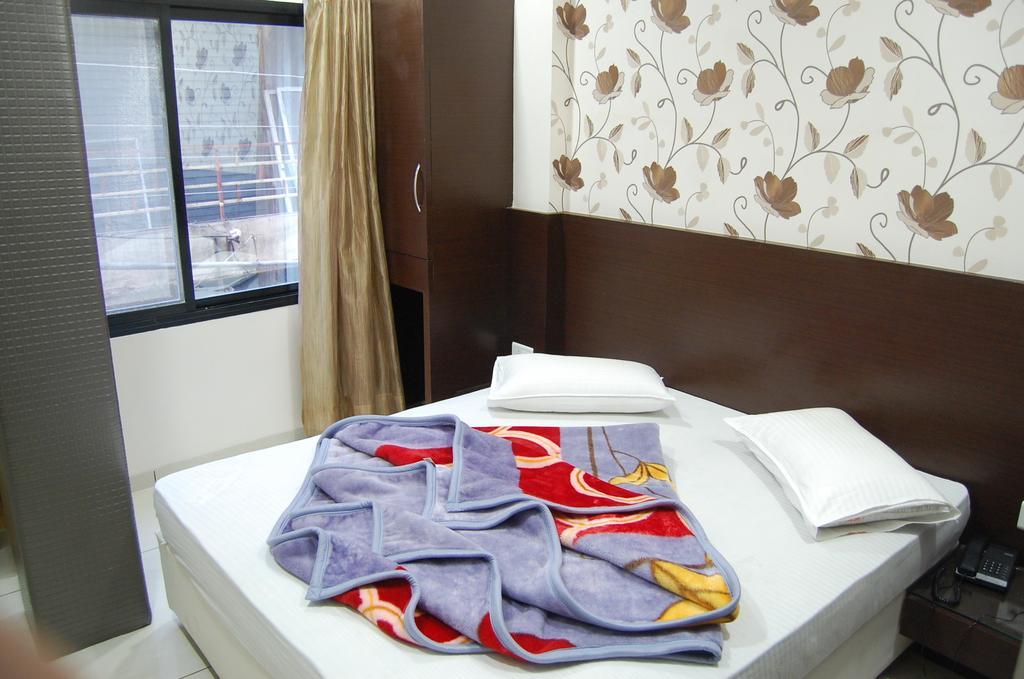 Hotel Poonam Palace Ujjain Rom bilde